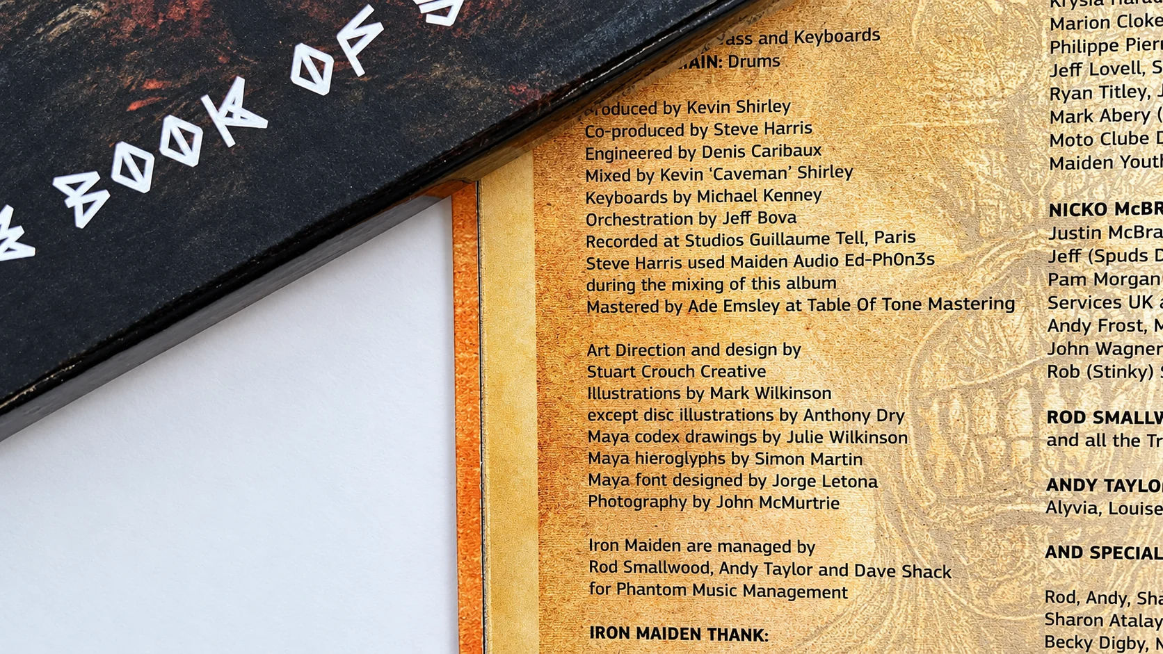 Close-up of the official booklet credit naming Jorge Letona