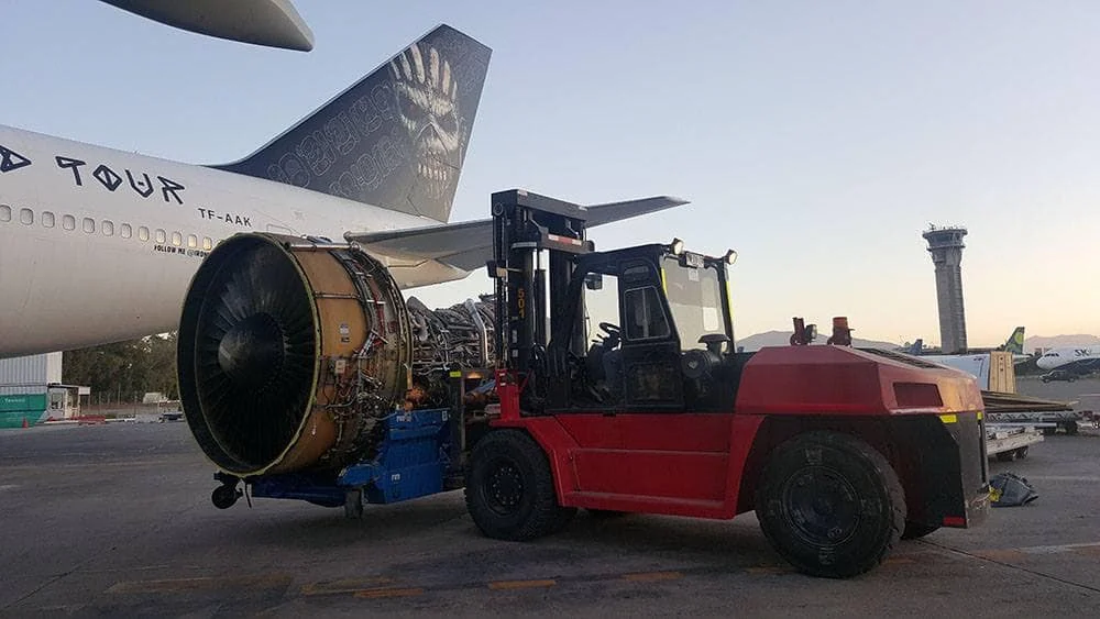 Ed Force One engine maintenance with forklift